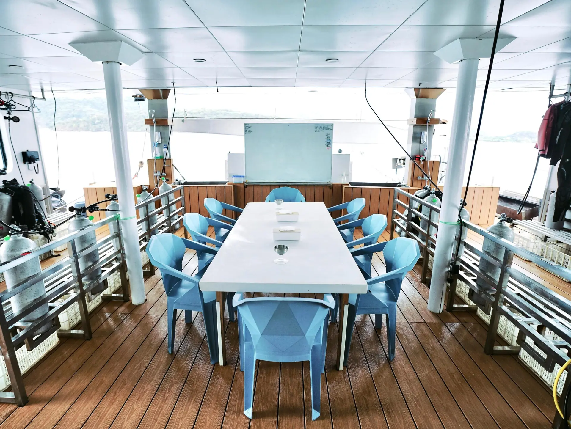 See I Sea dive deck with briefing table and scuba tanks